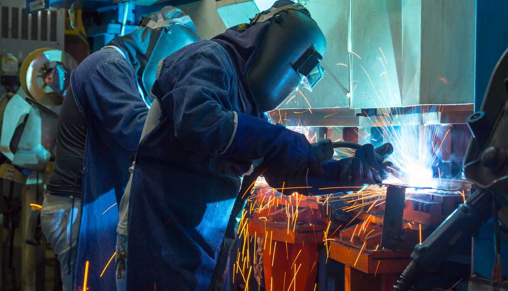 auto workers welding Mexico