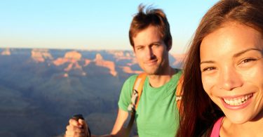 young couple hiking at grand canyon Arizona