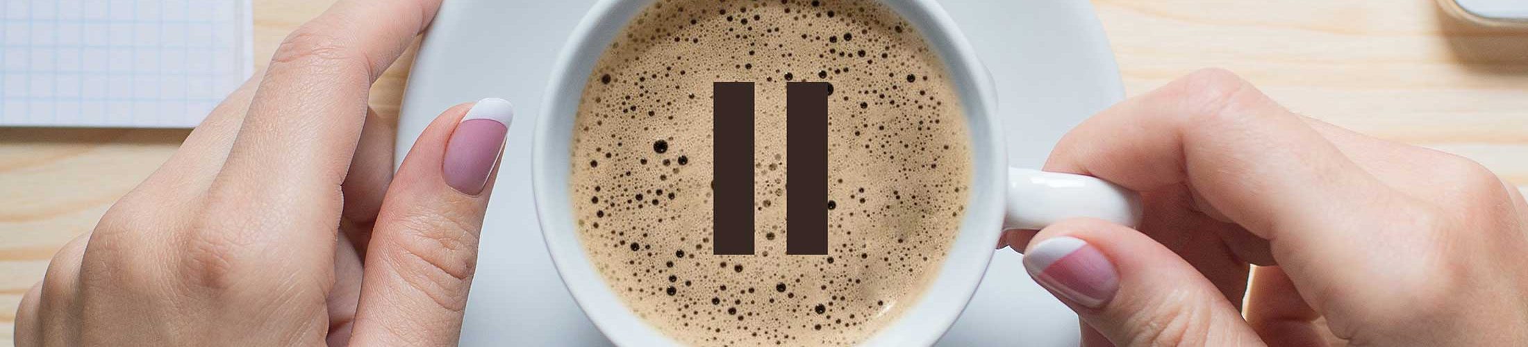 pause button in coffee cup