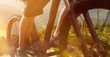 Mountain bike rider heading uphill