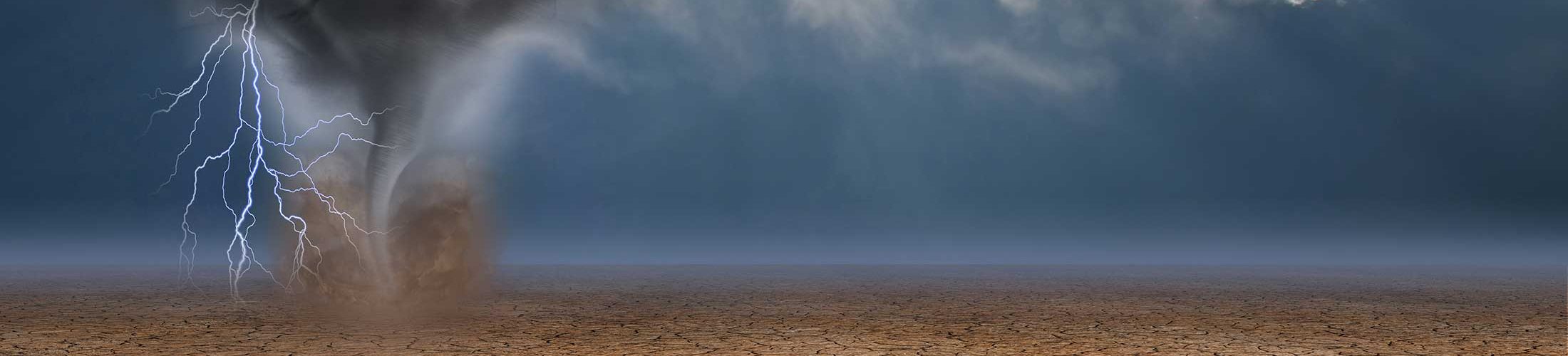 Desert with tornado and rain clouds