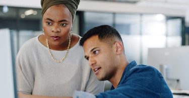 Man and woman collaborating on a project