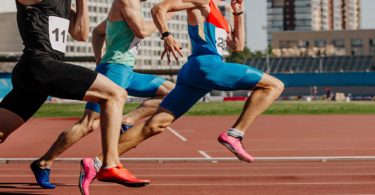 Three men racing track