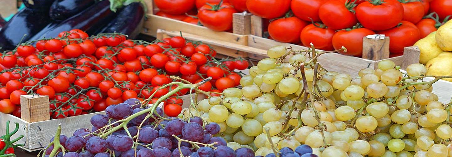 Grapes and tomatoes market stand