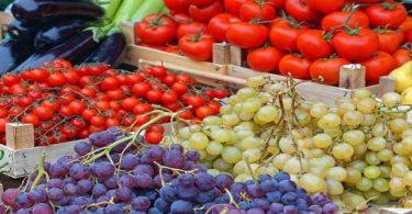 Grapes and tomatoes market stand