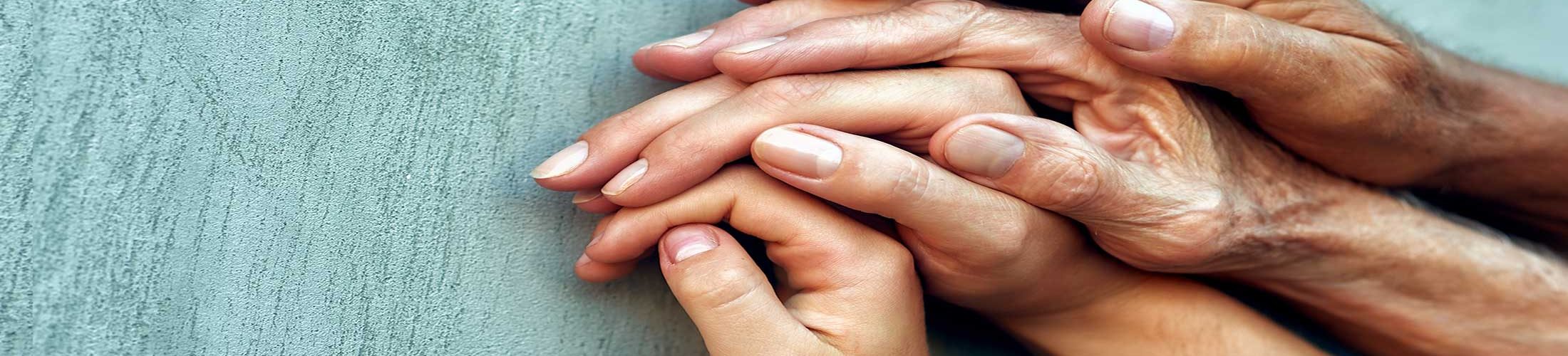 Four generations holding hands