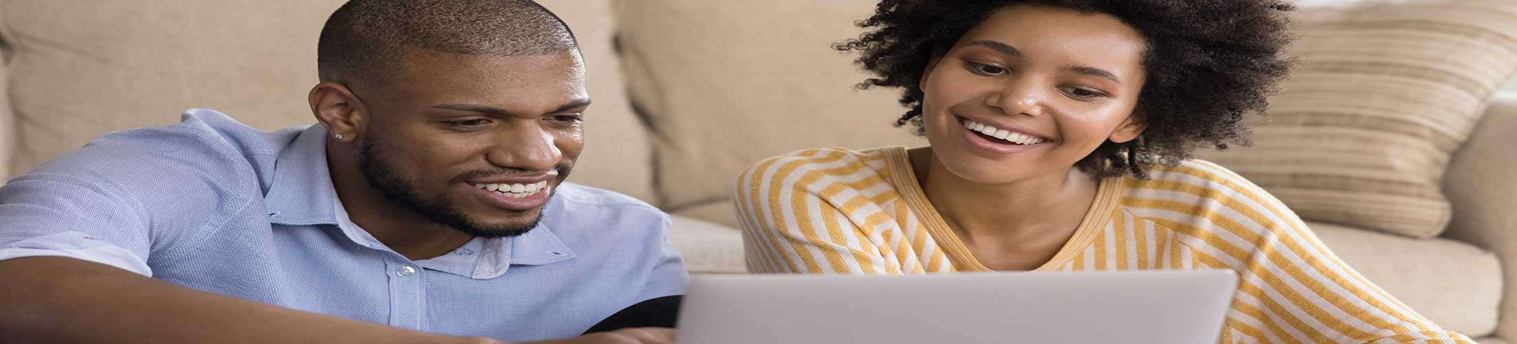 Couple looking at computer