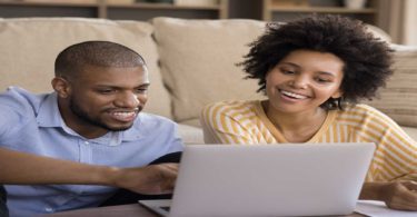 Couple looking at computer