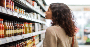 Woman looking at grocery aisle
