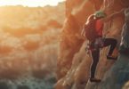 Woman solo rock climbing