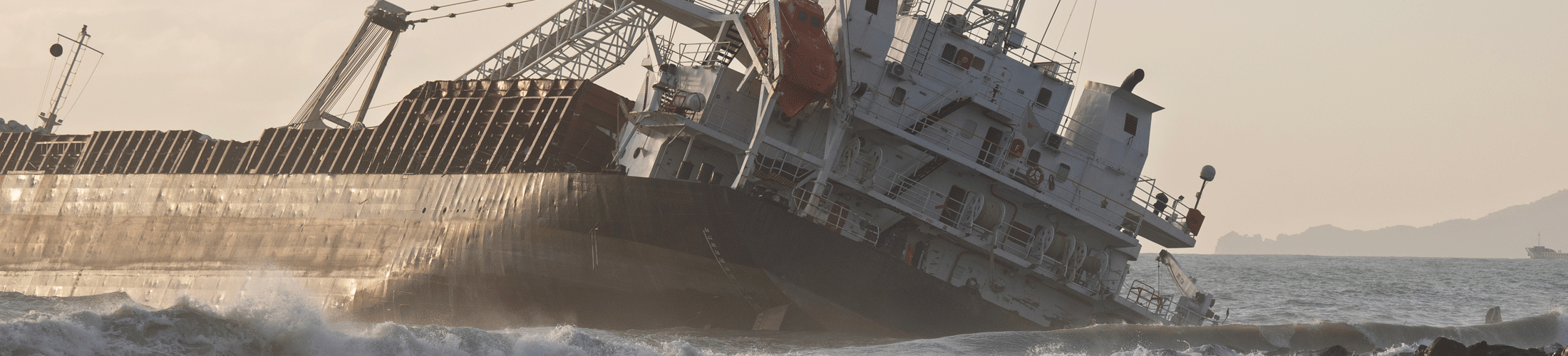 Cargo ship sinking ocean