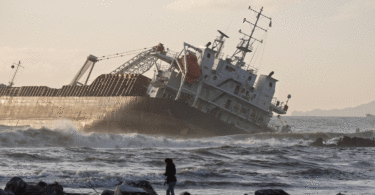 Cargo ship sinking ocean