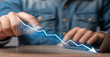 Man pointing to a downward pointing arrow