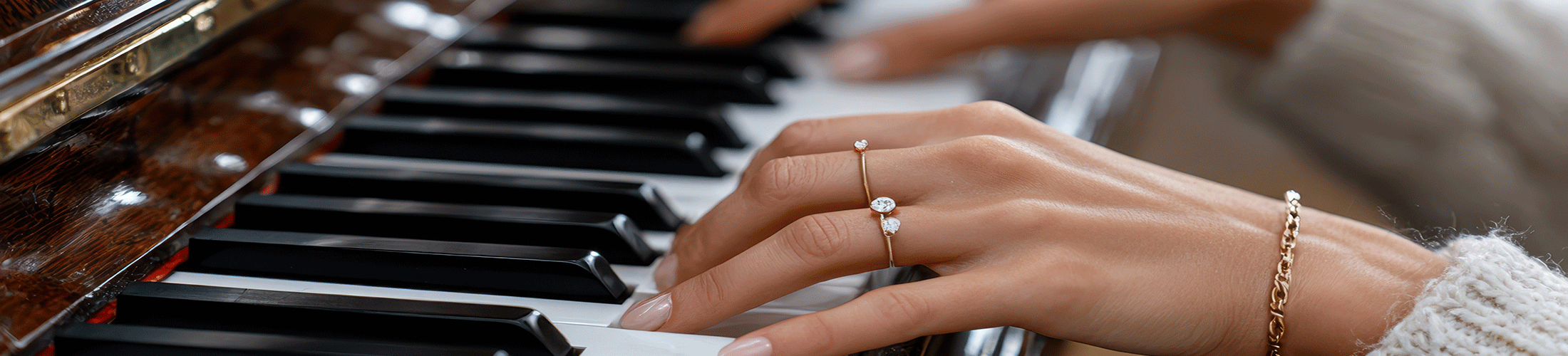 Female hands playing piano