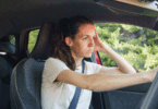 Woman stuck in car