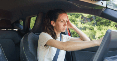 Woman stuck in car