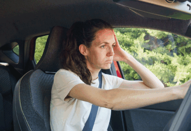 Woman stuck in car
